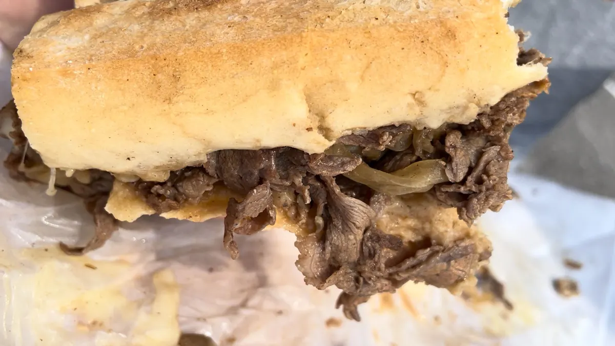 A close look at Pete's cheesesteak on a long roll